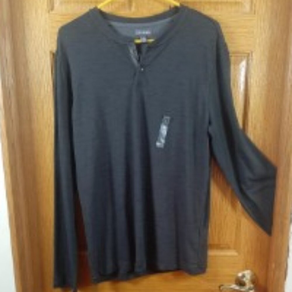 Van Heusen, Men's black, long sleeve " Never Tuck" Shirt.